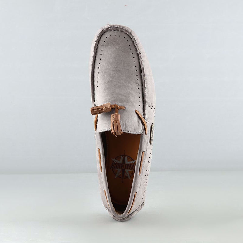 Classic tasseled loafer features supple suede